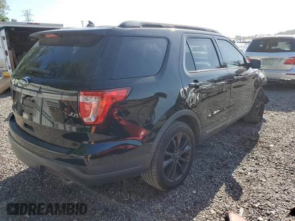 2018 Ford Explorer XLT with VIN 1FM5K7D82JGB75394, listed as a Copart auction lot 55030535 with 129,033 mi miles and Salvage title. Bid and sale history available at DreamBid. Image 3.