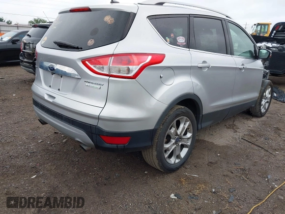 2015 Ford Escape Titanium with VIN 1FMCU0JX7FUB60418, listed as a IAAI auction lot 42485107 with 82,172 mi miles and . Bid and sale history available at DreamBid. Image 4.
