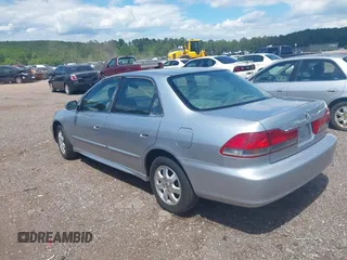 2002 Honda Accord EX z VIN 1HGCG56622A013090, wystawiony jako IAAI lot #42132291 z przebiegiem 152 567 mil mil oraz . Historia ofert i sprzedaży dostępna na DreamBid. Obrazek 3.