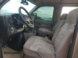 2004 Chevrolet Express Passenger z VIN 1GBFG15X641214559, wystawiony jako Copart lot #78751864 z przebiegiem 162 991 mil mil oraz Szkoda całkowita • Salvage title. Historia ofert i sprzedaży dostępna na DreamBid. Obrazek 7.