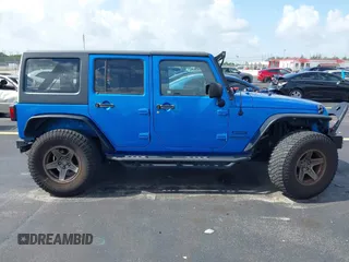 2015 Jeep Wrangler Unlimited Sport with VIN 1C4BJWDG1FL716400, listed as a IAAI auction lot 42645745 with 83,199 mi miles and . Bid and sale history available at DreamBid. Image 14.