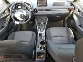 2016 Mazda CX-3 Sport z VIN JM1DKFB72G0138206, wystawiony jako Copart lot #52023695 z przebiegiem 101 734 mil mil oraz Szkody całkowita. Historia ofert i sprzedaży dostępna na DreamBid. Obrazek 8.