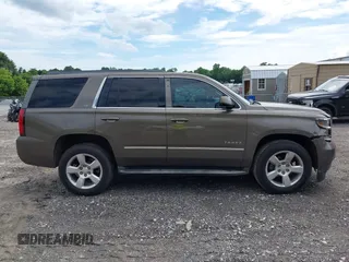 2015 Chevrolet Tahoe LT with VIN 1GNSCBKC5FR585138, listed as a IAAI auction lot 42420496 with 177,104 mi miles and . Bid and sale history available at DreamBid. Image 13.