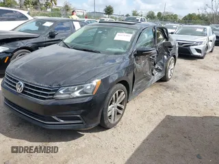 2019 Volkswagen Passat 2.0T Wolfsburg Edition with VIN 1VWLA7A34KC012694, listed as a IAAI auction lot 41579392 with 80,846 mi miles. Bid and sale history available at carsss.com. Image 18.