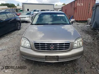 2004 Cadillac DeVille DHS z VIN 1G6KE57Y74U116879, wystawiony jako Copart lot #71017214 z przebiegiem 130 169 mil mil oraz Szkoda całkowita • Salvage title. Historia ofert i sprzedaży dostępna na DreamBid. Obrazek 5.