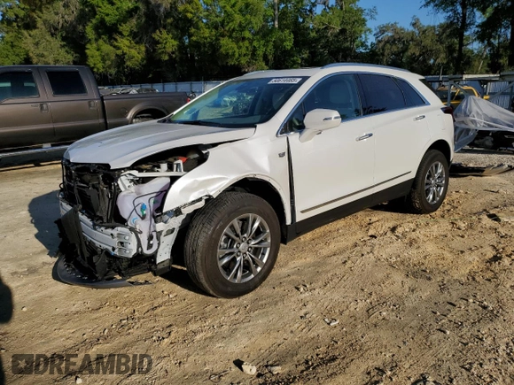 2023 Cadillac XT5 FWD Premium Luxury with VIN 1GYKNCR44PZ159038, listed as a Copart auction lot 50614465 with 11,781 mi miles and Salvage Title. Bid and sale history available at carsss.com. Image 1.