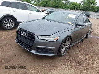 2016 Audi S6 Prestige z VIN WAUH2AFC1GN016187, wystawiony jako IAAI lot #42274744 z przebiegiem 169 821 mil mil oraz . Historia ofert i sprzedaży dostępna na DreamBid. Obrazek 2.