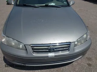 2000 Toyota Camry CE z VIN 4T1BG22K6YU682705, wystawiony jako IAAI lot #42080842 z przebiegiem 376 532 mil mil oraz . Historia ofert i sprzedaży dostępna na DreamBid. Obrazek 6.