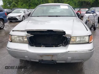 2001 Mercury Grand Marquis GS z VIN 2MEFM74W91X618246, wystawiony jako IAAI lot #42226130 z przebiegiem 125 487 mil mil oraz . Historia ofert i sprzedaży dostępna na DreamBid. Obrazek 6.