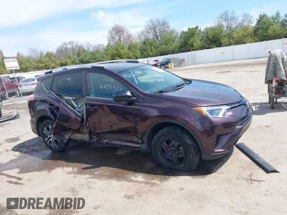 2016 Toyota RAV4 LE with VIN 2T3ZFREV8GW310580, listed as a IAAI auction lot 42063071 with 104,099 mi miles and . Bid and sale history available at DreamBid. Image 14.