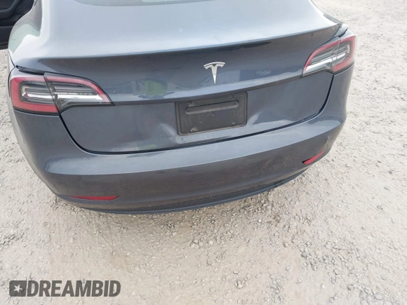 2023 Tesla Model 3 with VIN 5YJ3E1EA5PF474382, listed as a IAAI auction lot 41764268 with 31,040 mi miles and . Bid and sale history available at DreamBid. Image 6.