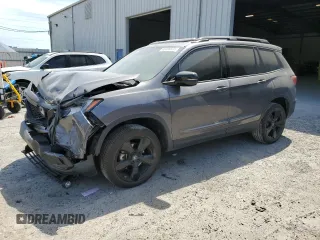 2021 Honda Passport Elite with VIN 5FNYF8H08MB014398, listed as a Copart auction lot 50499375 with 52,550 mi miles and Salvage Title. Bid and sale history available at carsss.com. Image 1.