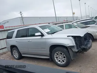 2015 GMC Yukon SLT z VIN 1GKS1BKC0FR172661, wystawiony jako IAAI lot #41911331 z przebiegiem 171 815 mil mil oraz . Historia ofert i sprzedaży dostępna na DreamBid. Obrazek 14.