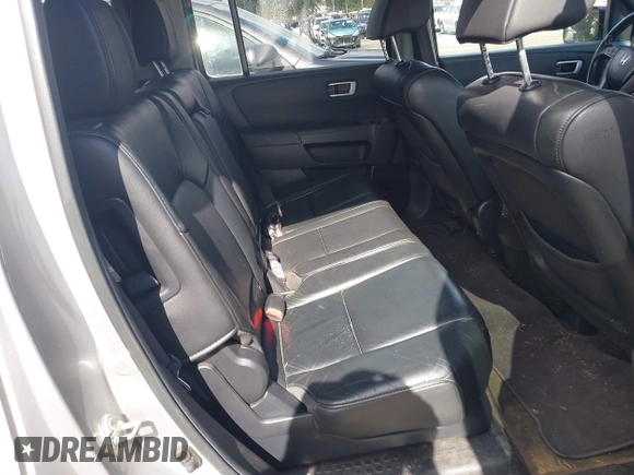 2013 Honda Pilot EX-L with VIN 5FNYF4H71DB041562, listed as a IAAI auction lot 41819184 with 136,014 mi miles and . Bid and sale history available at DreamBid. Image 8.