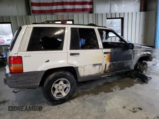 1998 Jeep Grand Cherokee Laredo with VIN 1J4GZ58S2WC222595, listed as a Copart auction lot 51108625 with 0 mi miles and Salvage Title. Bid and sale history available at carsss.com. Image 3.