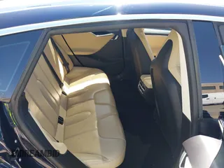 2014 Tesla Model S 60 with VIN 5YJSA1H12EFP46760, listed as a IAAI auction lot 42344596 with 106,252 mi miles and . Bid and sale history available at DreamBid. Image 8.