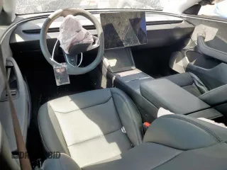 2025 Tesla Model 3 Long Range with VIN 5YJ3E1EB0SF921606, listed as a Copart auction lot 60728995 with 6,281 mi miles and Salvage title. Bid and sale history available at DreamBid. Image 8.