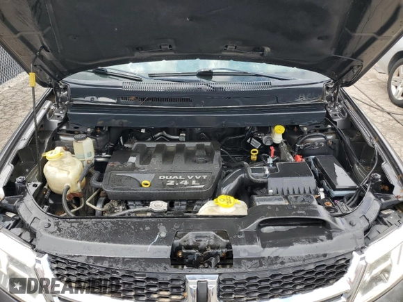 2014 Dodge Journey American Value with VIN 3C4PDCAB1ET135504, listed as a Copart auction lot 58803645 with 164,501 mi miles and Clean title. Bid and sale history available at DreamBid. Image 12.