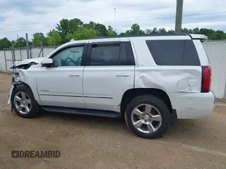 2020 Chevrolet Tahoe LT with VIN 1GNSCBKC4LR181887, listed as a IAAI auction lot 42160821 with 106,757 mi miles and . Bid and sale history available at DreamBid. Image 14.