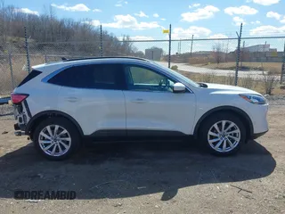 2022 Ford Escape Titanium with VIN 1FMCU9J93NUA99685, listed as a IAAI auction lot 41867437 with 36,987 mi miles and . Bid and sale history available at DreamBid. Image 14.