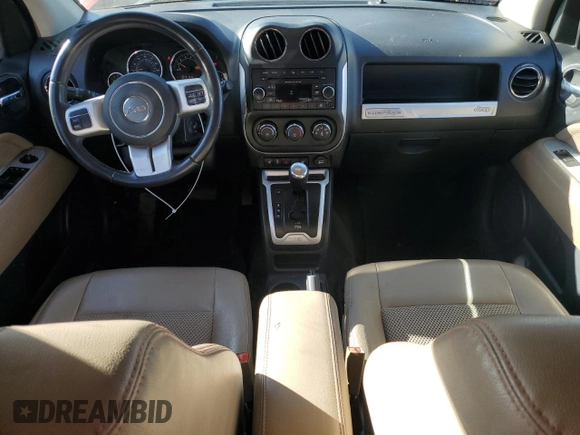 2016 Jeep Compass Latitude with VIN 1C4NJCEB2GD749061, listed as a Copart auction lot 83071564 with 127,616 mi miles and Salvage Title. Bid and sale history available at carsss.com. Image 8.