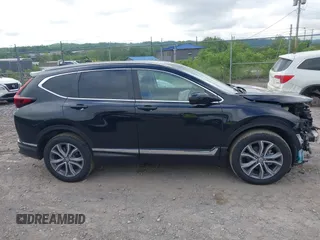 2021 Honda CR-V Touring with VIN 5J6RW2H92ML003064, listed as a IAAI auction lot 42298361 with 70,988 mi miles and . Bid and sale history available at DreamBid. Image 14.