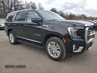 2022 GMC Yukon SLT with VIN 1GKS2BKD0NR290942, listed as a Copart auction lot 82338794 with 26,392 mi miles and Salvage Title. Bid and sale history available at carsss.com. Image 4.