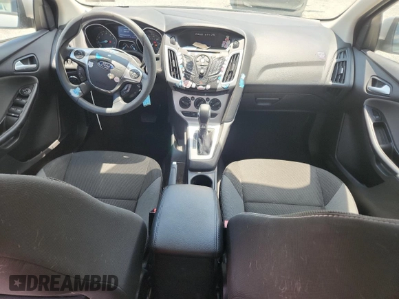 2013 Ford Focus SE with VIN 1FADP3F22DL323418, listed as a Copart auction lot 61859225 with 62,415 mi miles and Salvage title. Bid and sale history available at DreamBid. Image 8.