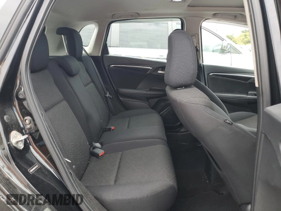 2015 Honda Fit EX-L z VIN 3HGGK5H89FM701322, wystawiony jako Copart lot #56565885 z przebiegiem 195 154 mil mil oraz Szkoda całkowita • Salvage title. Historia ofert i sprzedaży dostępna na DreamBid. Obrazek 10.