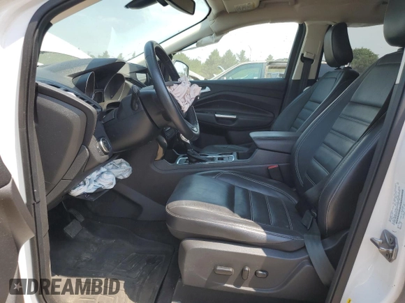 2019 Ford Escape Titanium z VIN 1FMCU9J93KUA51020, wystawiony jako Copart lot #60462495 z przebiegiem 59 998 mil mil oraz Szkoda całkowita • Salvage title. Historia ofert i sprzedaży dostępna na DreamBid. Obrazek 7.