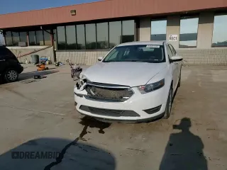 2016 Ford Taurus SEL with VIN 1FAHP2H89GG122884, listed as a Copart auction lot 53597595 with 128,627 mi miles and Salvage title. Bid and sale history available at DreamBid. Image 13.