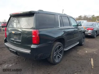 2016 Chevrolet Tahoe LTZ with VIN 1GNSKCKC1GR297871, listed as a IAAI auction lot 41442380 with 91,354 mi miles. Bid and sale history available at carsss.com. Image 4.