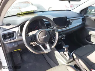 2023 Kia Rio S with VIN 3KPA24AD4PE573279, listed as a IAAI auction lot 41885298 with 11,561 mi miles. Bid and sale history available at carsss.com. Image 20.