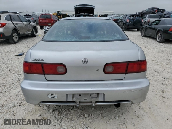 2001 Acura Integra LS z VIN JH4DB76571S000122, wystawiony jako Copart lot #68906974 z przebiegiem 162 045 mil mil oraz Czysty tytuł • Clean title. Historia ofert i sprzedaży dostępna na DreamBid. Obrazek 6.