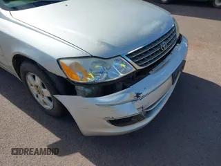 2003 Toyota Avalon XL z VIN 4T1BF28B93U274928, wystawiony jako IAAI lot #42034461 z przebiegiem 150 549 mil mil oraz . Historia ofert i sprzedaży dostępna na DreamBid. Obrazek 6.