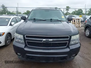 2011 Chevrolet Suburban with VIN 1GNWKMEG1BR374950, listed as a IAAI auction lot 42781182 with 304,690 mi miles and . Bid and sale history available at DreamBid. Image 12.