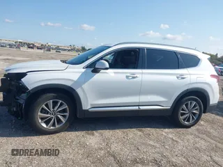 2019 Hyundai Santa Fe SEL with VIN 5NMS33AD6KH081690, listed as a IAAI auction lot 41961423 with 114,389 mi miles and . Bid and sale history available at DreamBid. Image 15.