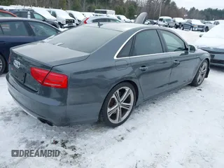 2014 Audi S8 with VIN WAUD2AFD8EN011752, listed as a IAAI auction lot 41556173 with 115,648 mi miles. Bid and sale history available at carsss.com. Image 4.
