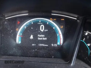 2020 Honda Civic LX with VIN 19XFC2F66LE007328, listed as a IAAI auction lot 41852111 with 135,956 mi miles and . Bid and sale history available at DreamBid. Image 7.