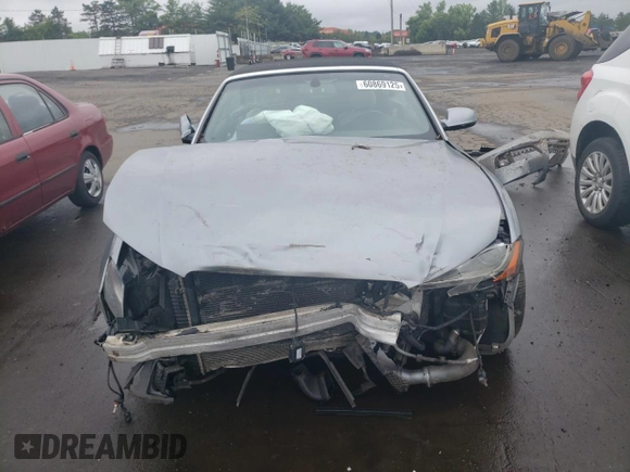 2010 Audi A5 Premium Plus z VIN WAULFAFHXAN021616, wystawiony jako Copart lot #60869125 z przebiegiem Nie podano mil oraz Szkoda całkowita • Salvage title. Historia ofert i sprzedaży dostępna na DreamBid. Obrazek 5.