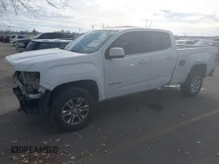 2019 GMC Canyon 4WD SLE z VIN 1GTG6CEN5K1297945, wystawiony jako IAAI lot #41308105 z przebiegiem 93 226 mil mil oraz . Historia ofert i sprzedaży dostępna na DreamBid. Obrazek 17.