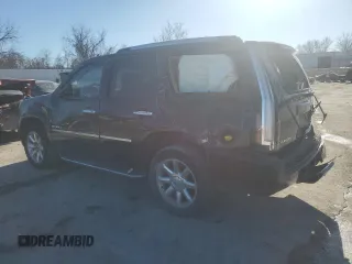 2014 GMC Yukon Denali with VIN 1GKS2EEF7ER170165, listed as a Copart auction lot 47138225 with 123,678 mi miles and Salvage Title. Bid and sale history available at carsss.com. Image 2.