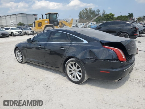 2012 Jaguar XJ with VIN SAJWA1CB5CLV27448, listed as a Copart auction lot 53373985 with 90,603 mi miles and Salvage Title. Bid and sale history available at DreamBid. Image 2.
