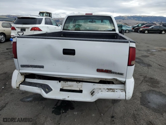 1997 GMC Sonoma SLS with VIN 1GTCS19X2V8516379, listed as a Copart auction lot 84080794 with 257,607 mi miles and Salvage Title. Bid and sale history available at carsss.com. Image 6.