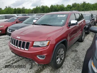 2014 Jeep Grand Cherokee Limited with VIN 1C4RJFBMXEC409071, listed as a Copart auction lot 58671325 with 215,044 mi miles and Clean title. Bid and sale history available at DreamBid. Image 1.