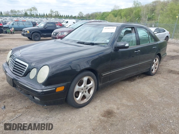 2002 Mercedes-Benz E-Class with VIN WDBJF65J52B496832, listed as a IAAI auction lot 42202331 with 156,304 mi miles. Bid and sale history available at carsss.com. Image 2.