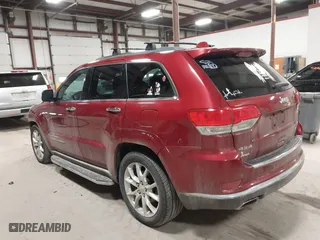 2014 Jeep Grand Cherokee Summit with VIN 1C4RJFJT4EC308729, listed as a IAAI auction lot 41694212 with 175,654 mi miles. Bid and sale history available at carsss.com. Image 3.