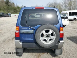 1999 Mitsubishi Montero z VIN H58A0013724, wystawiony jako Copart lot #52986435 z przebiegiem 88 711 mil mil oraz Szkoda całkowita • Salvage title. Historia ofert i sprzedaży dostępna na DreamBid. Obrazek 6.