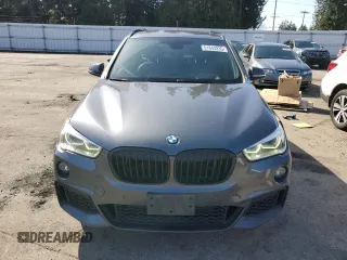 2016 BMW X1 xDrive28i with VIN WBXHT3C36G5E48019, listed as a Copart auction lot 51843235 with 95,711 mi miles and Salvage Title. Bid and sale history available at carsss.com. Image 5.