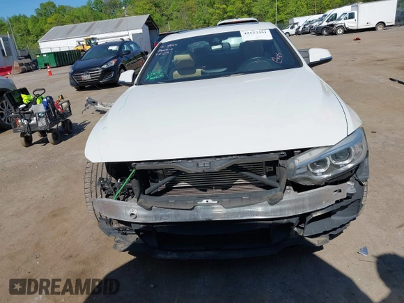 2014 BMW 4 Series 435i z VIN WBA3R1C51EK192103, wystawiony jako IAAI lot #42127351 z przebiegiem 99 023 mil mil oraz . Historia ofert i sprzedaży dostępna na DreamBid. Obrazek 12.